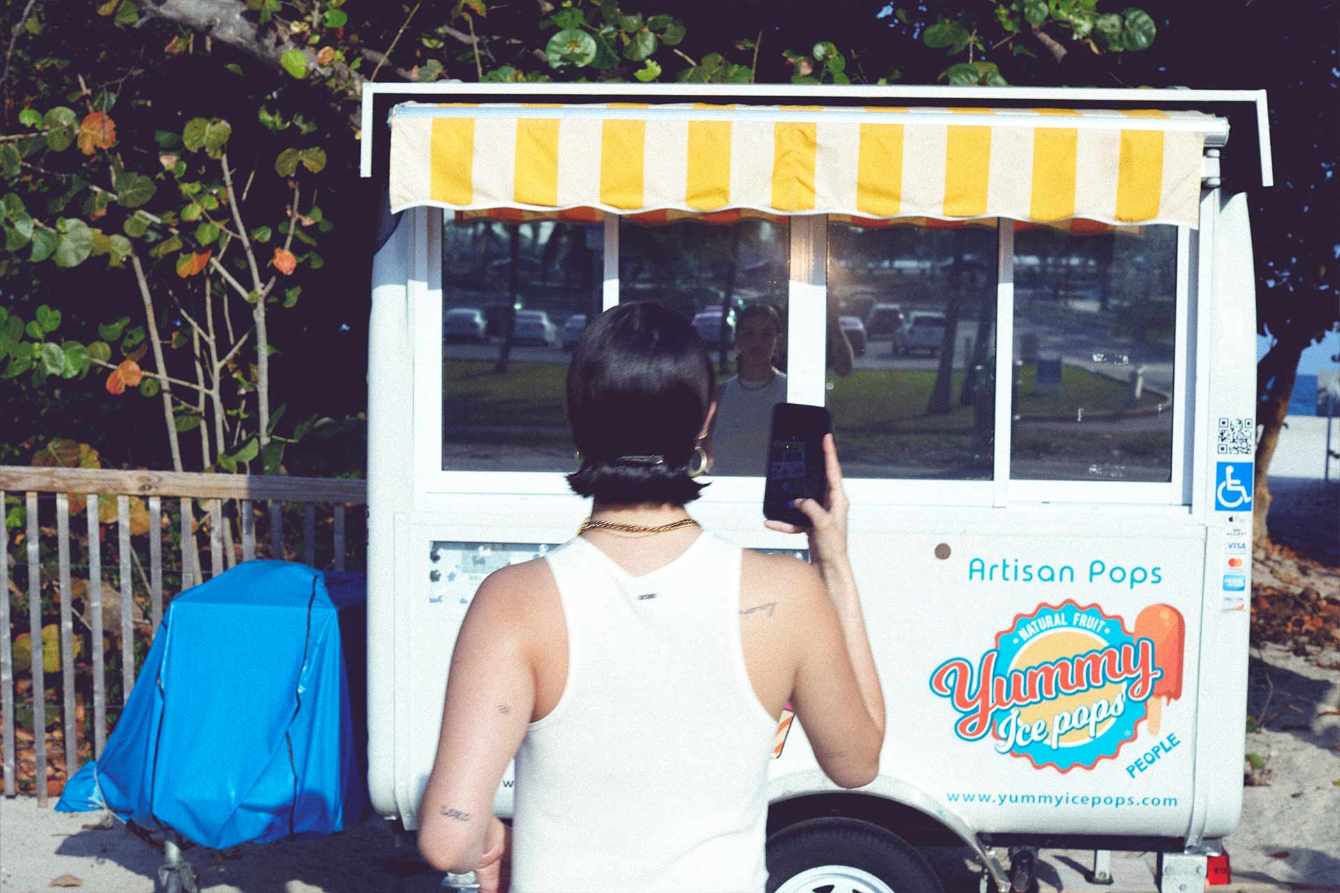 Edie Rose taking picture of ice cream van