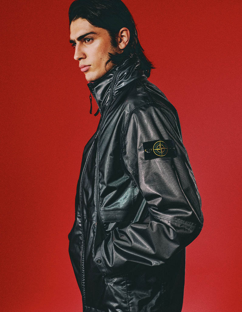male model in black Stone Island jacket 