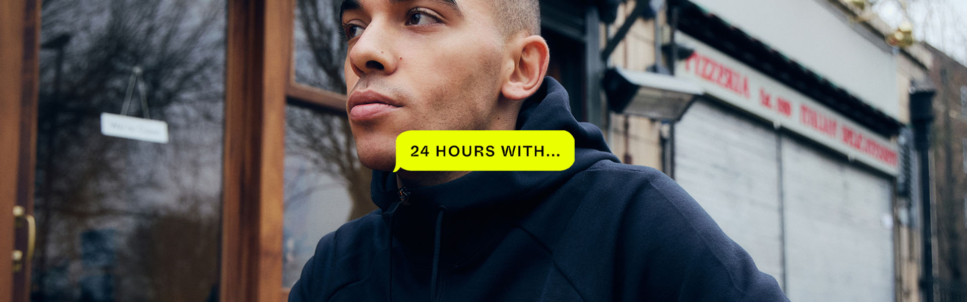 Influencer Jed Ghardi in black zip up top