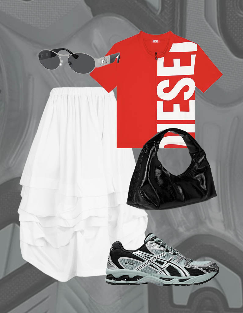 White mid-length skirt, silver sunglasses, red Diesel top, black shoulder bag and black and silver asics trainers