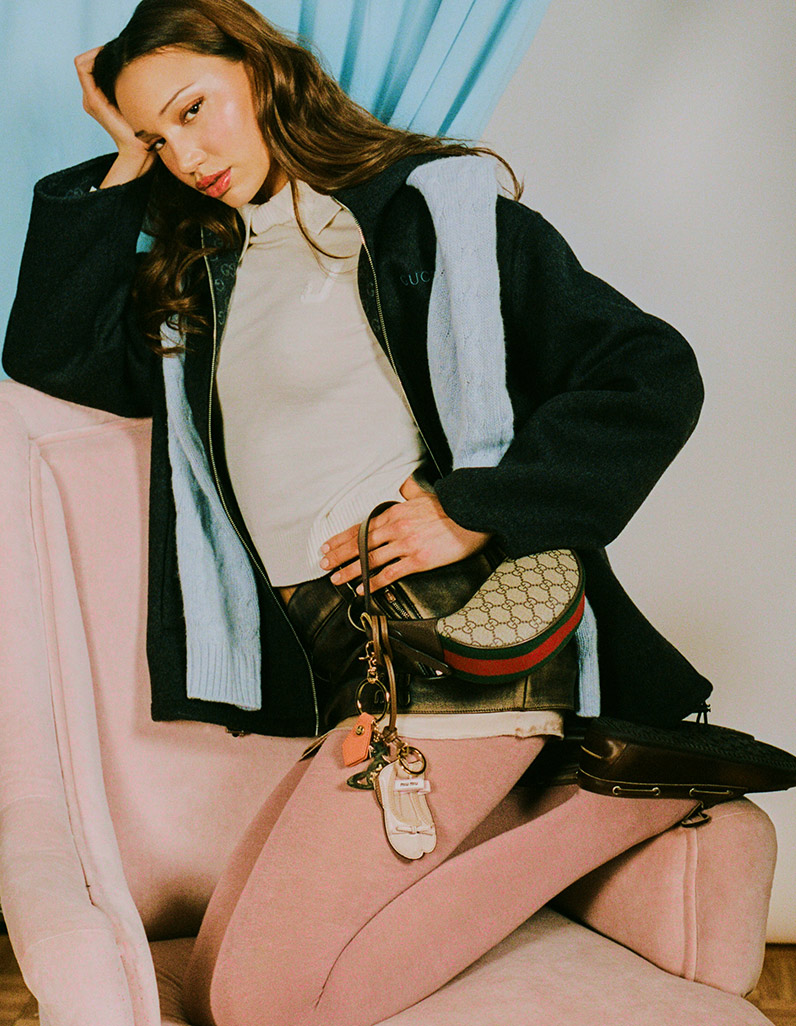 A model wearing A Bathing Ape puffer jacket and Balenciaga Shorts