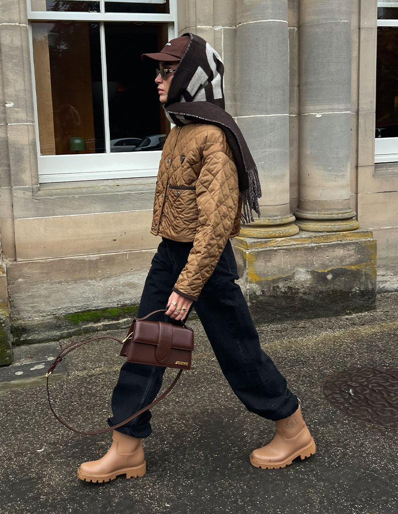 Alicia Roddy in Prada quilted jacket, Saint Laurent jeans and Jacquemus accessories.