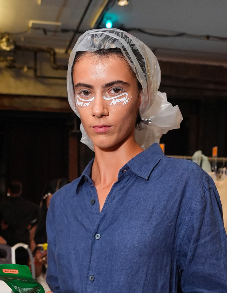 IRIS LAW WALKS AT VERSACE RUNWAY