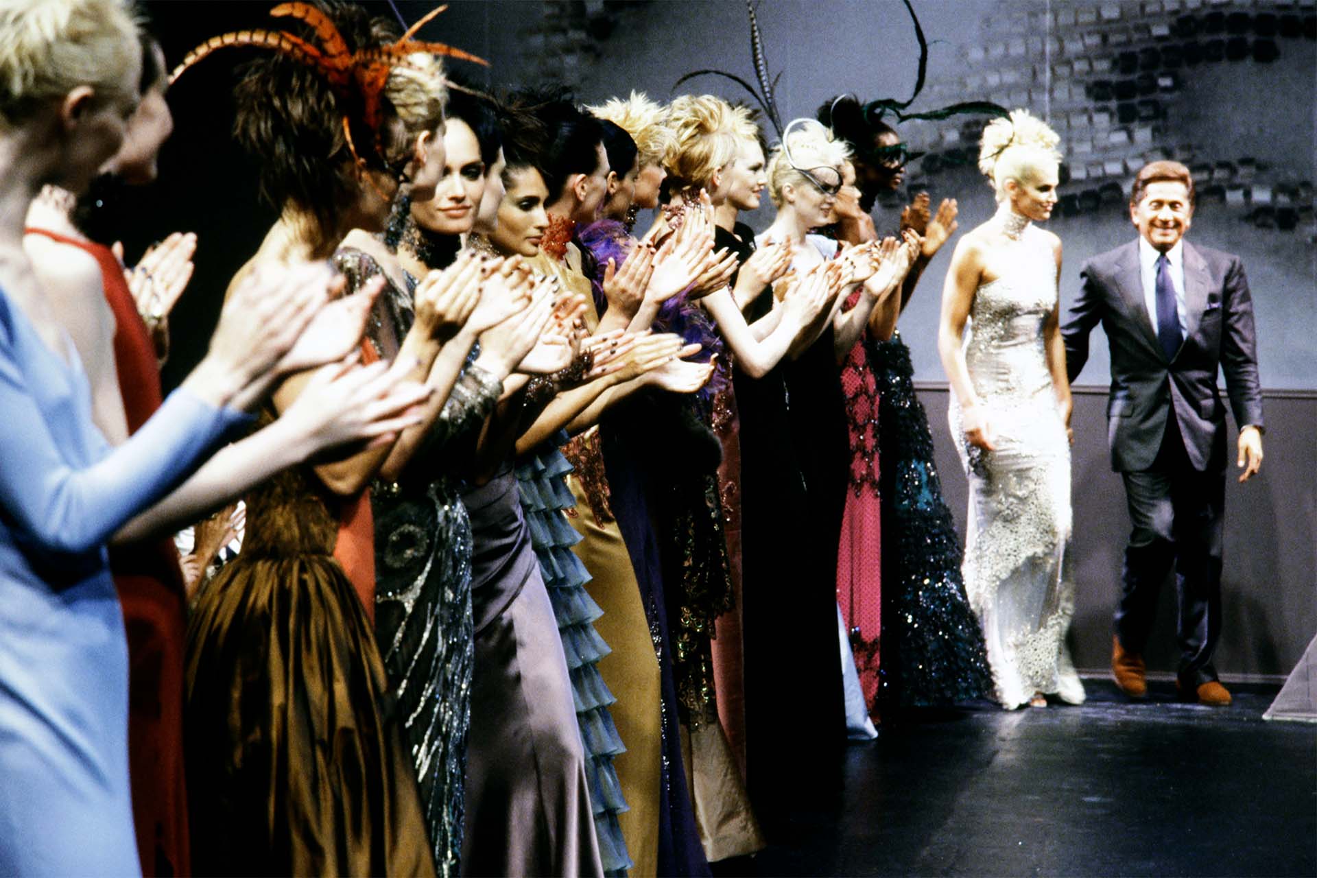 Valentino walks the runway at the end of his show.