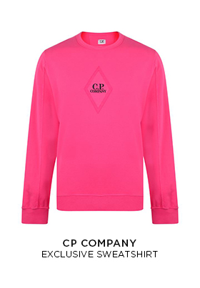 FLANNELS X C.P Company pink exclusive sweatshirt with a black C.P. Company embroidered logo